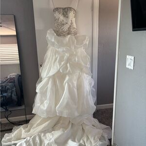 Elegant White Strapless Gown with Silver Embellishments